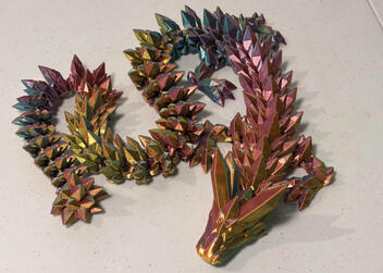 Articulated and decorative dragons printed in a range of colours and finishes. Designed by creators like Cinderwing3D and printed to order.